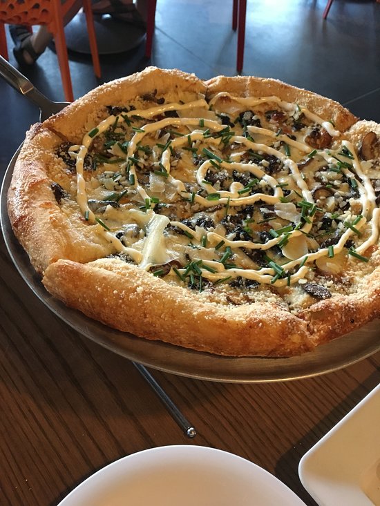 Mellow Mushroom signature dishes Holy Shiitake PieMaui Wowie Veggie Calzone